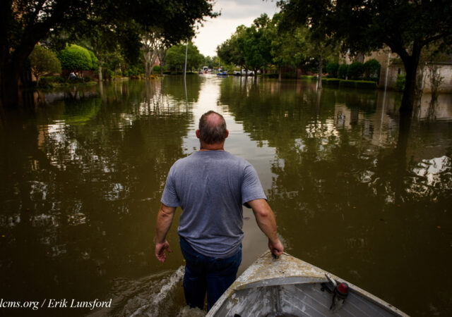 David Kunz of Memorial Lutheran Church, Houston, walks a boat through a flooded neighborhood on Monday, Sept. 4, 2017, in Houston. LCMS Communications/Erik M. Lunsford
