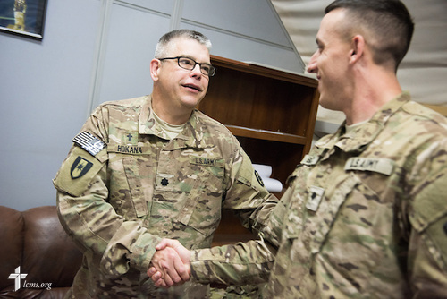 Army Lt. Col Steven Hokana, chaplain, visits a soldier at Camp Arifjan on Tuesday, March 24, 2015, in Kuwait. LCMS Communications/Erik M. Lunsford