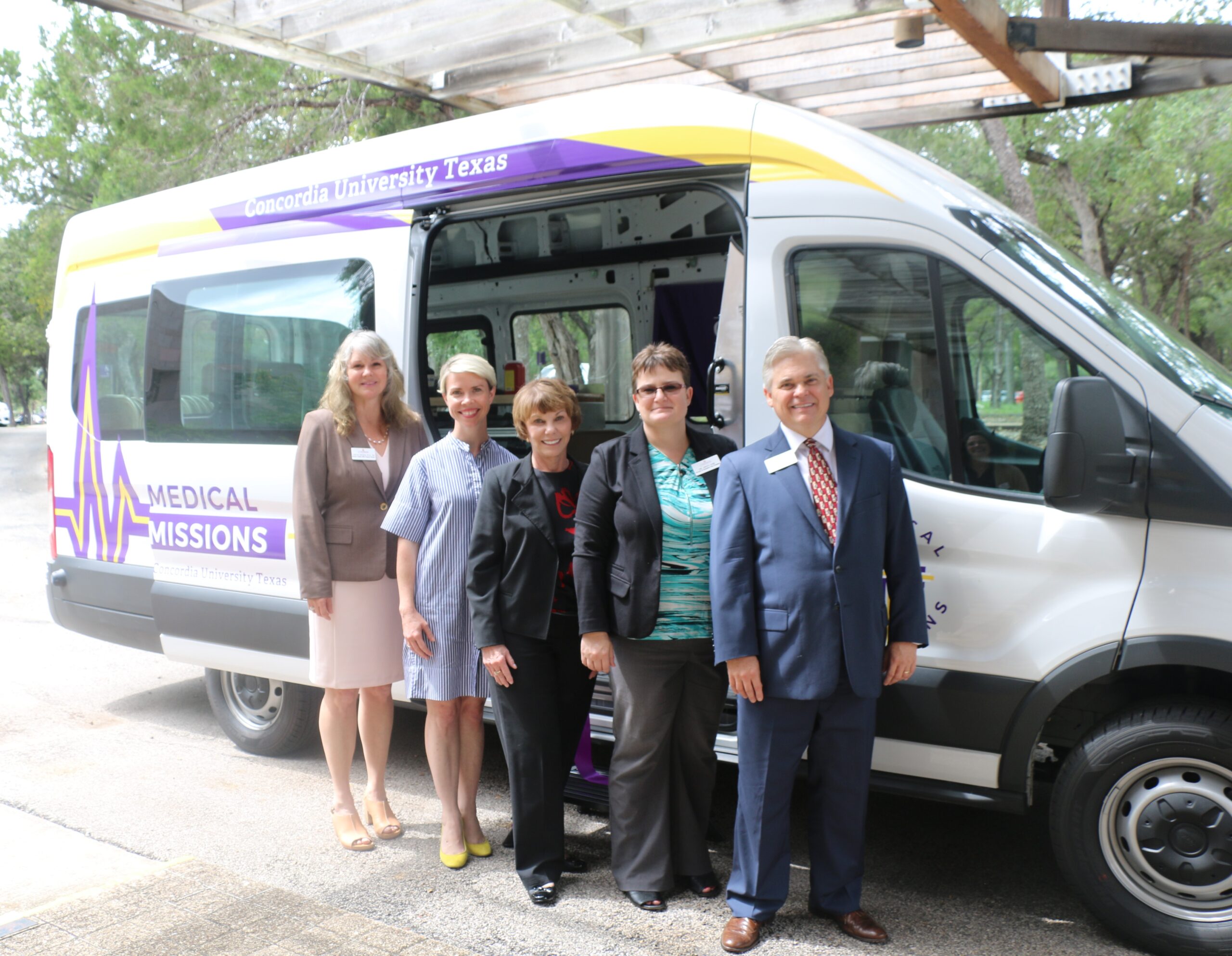 Concordia Texas representatives stand in front of the new Mobile Medical Missions van to be used with CTX's nursing program. Used with permission