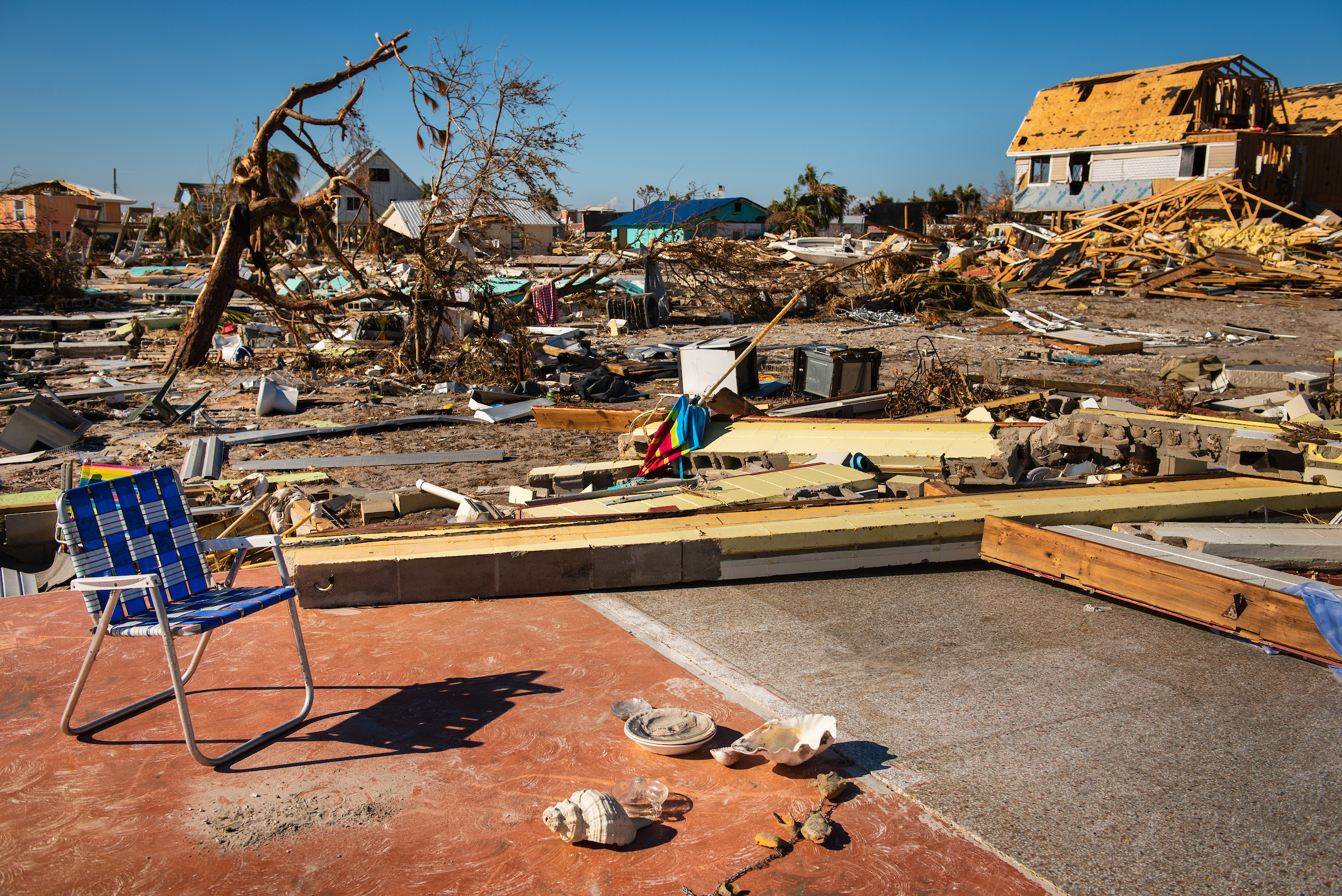 A lawn chair on a foundation where a home once stood on Tuesday, Oct. 16, 2018, in Mexico Beach, Fla. Hurricane Michael devastated the area the previous week. LCMS Communications/Erik M. Lunsford