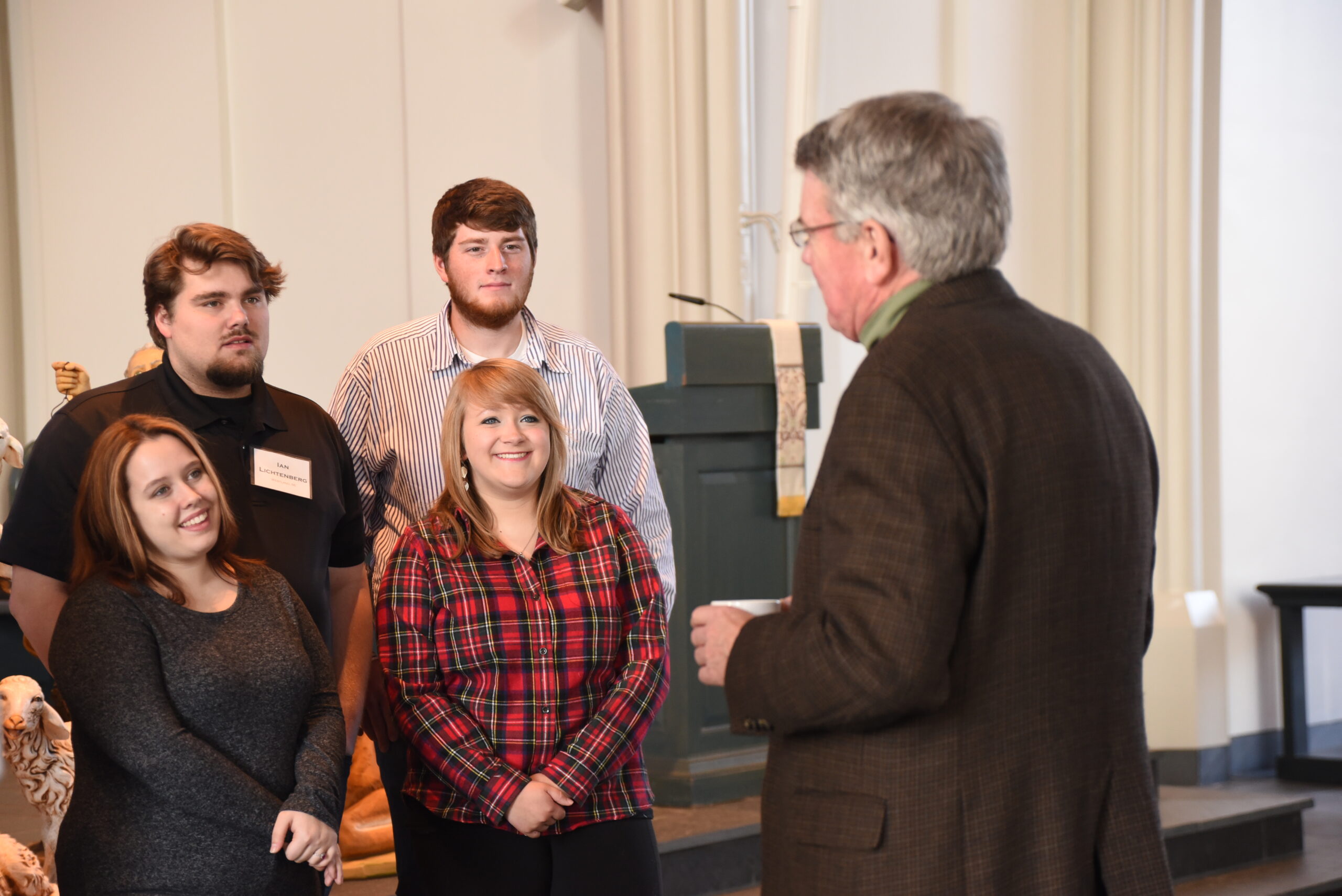 Rev. Dr. Dale Meyer speaks to Green and Gold Day participants.