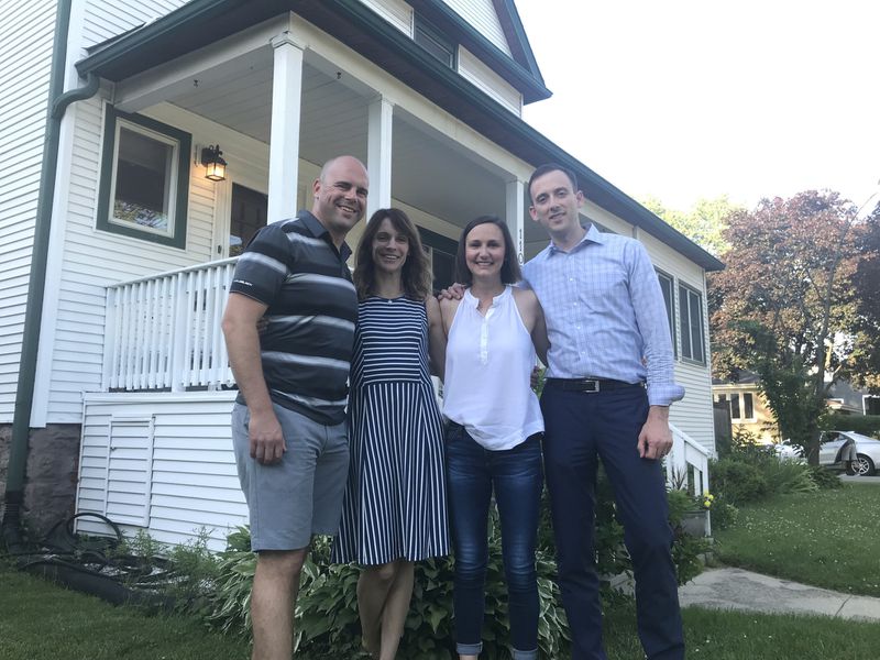 From left: Pastor Matthew Hoffman and his wife, Anne, join Ellen and Ryan Totten outside the Hoffmans' Park Ridge home on July 1. Hoffman donated 60 percent of his liver to Ellen Totten. (Jennifer Johnson / Pioneer Press)