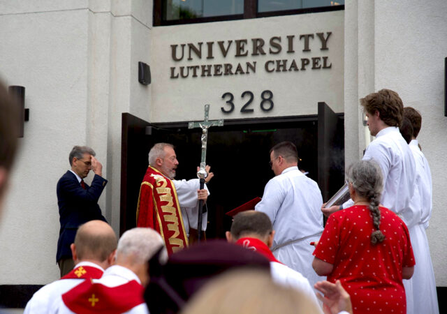 Rev. David Kind joins clergy and congregation at the dedication of the new University Lutheran Chapel in Minneapolis, Minnesota.
